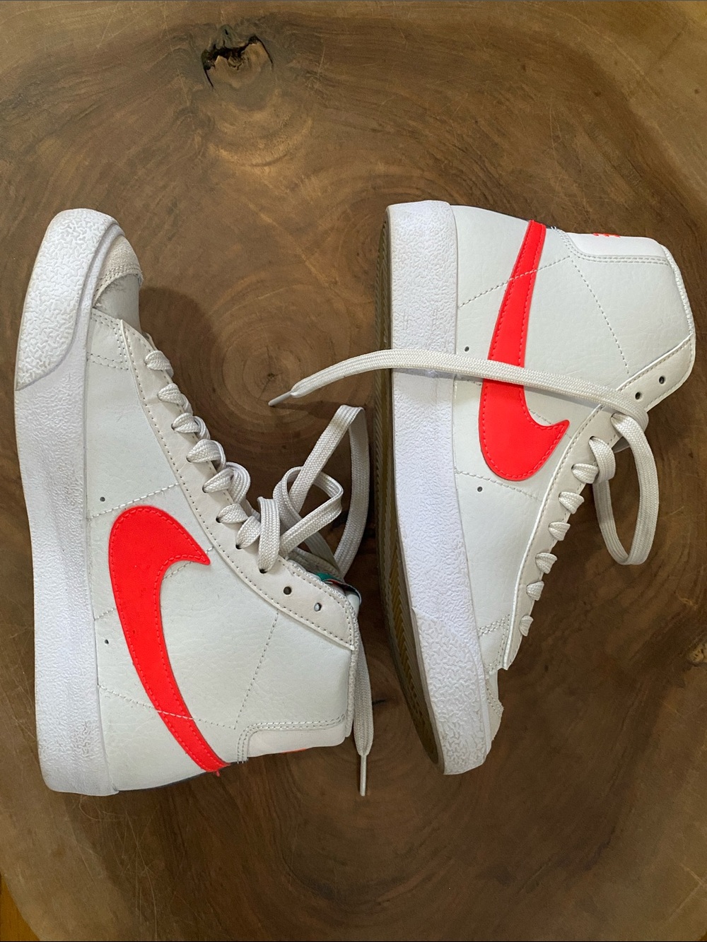 Nike Women's White High-Top Sneakers with Bright Red Swoosh